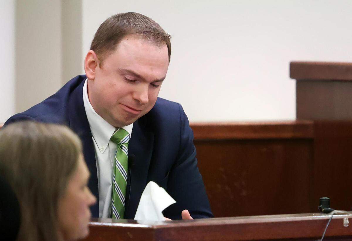 Defendant Aaron Dean reacts on the stand while testifying on Monday, December 12, 2022, in Fort Worth. Dean, a former Fort Worth police officer, is accused of murder after fatally shooting Atatiana Jefferson in 2019 through a window at her home.