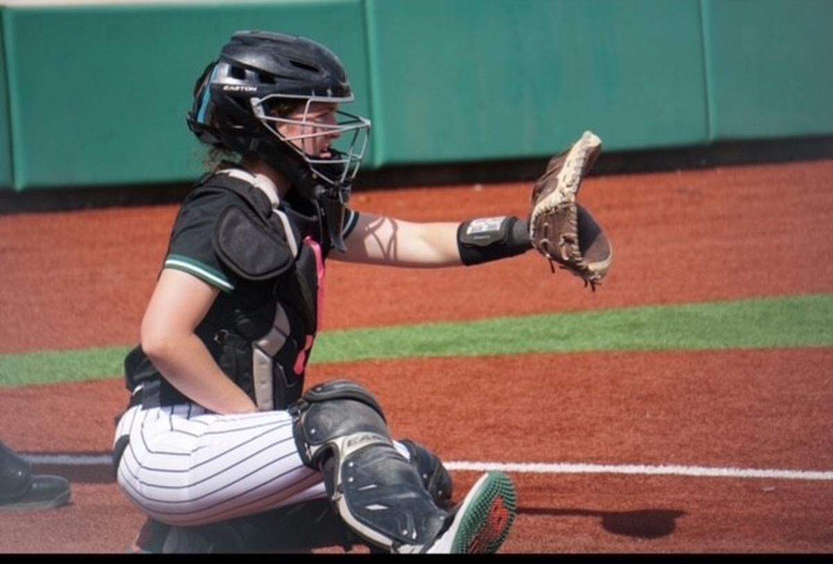 Arlington’s Abby Moore transitioned from baseball to softball and is helping lead the Colts to success.