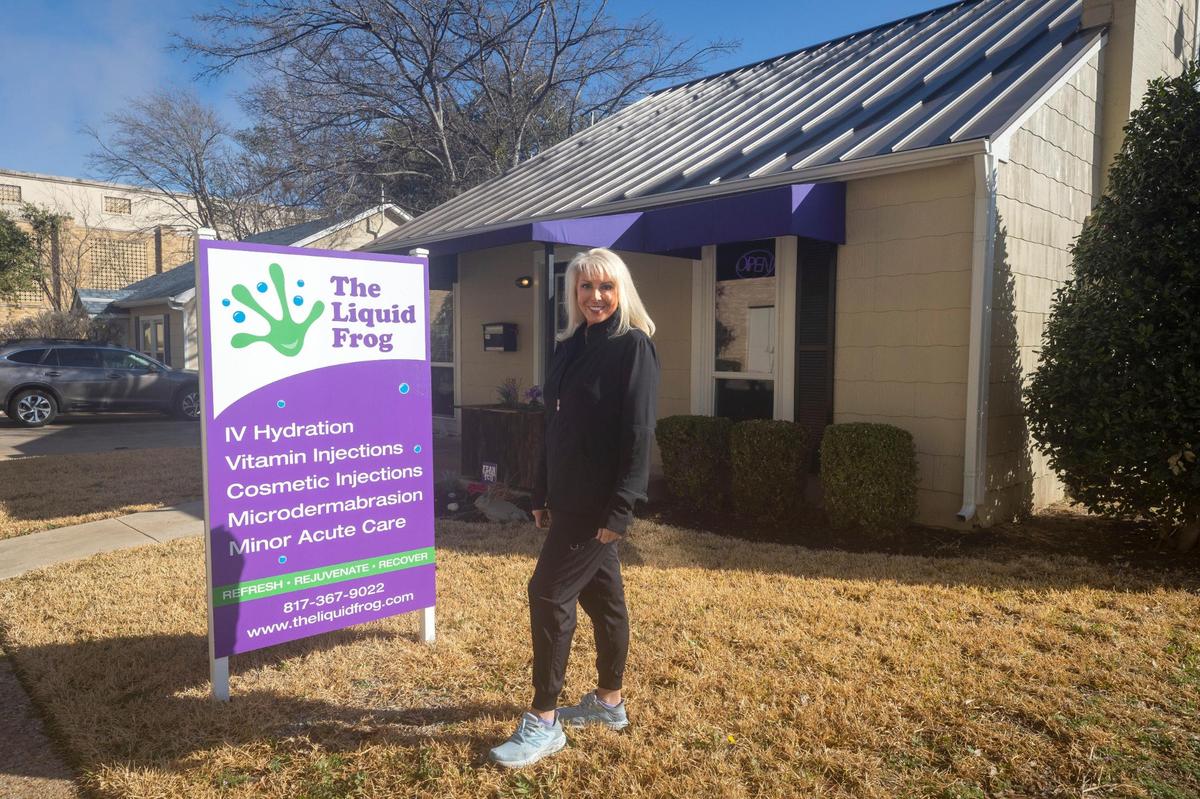 Shawna Smith outside of her business The Liquid Frog in Fort Worth on Thursday, Feb. 9, 2023. The wellness center specializes in IV hydration and provides services like Botox and other medical testing.