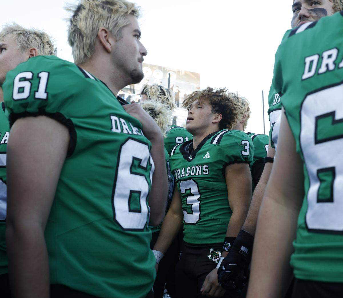 Southlake Carroll running back Davis Penn (3) stands with teammates during the school song after defeating Denton Guyer in a UIL Class 6A Division II Quarterfinal on Saturday, Dec. 6, 2025, at Crowley ISD Multi-Purpose Stadium in Fort Worth, Texas.