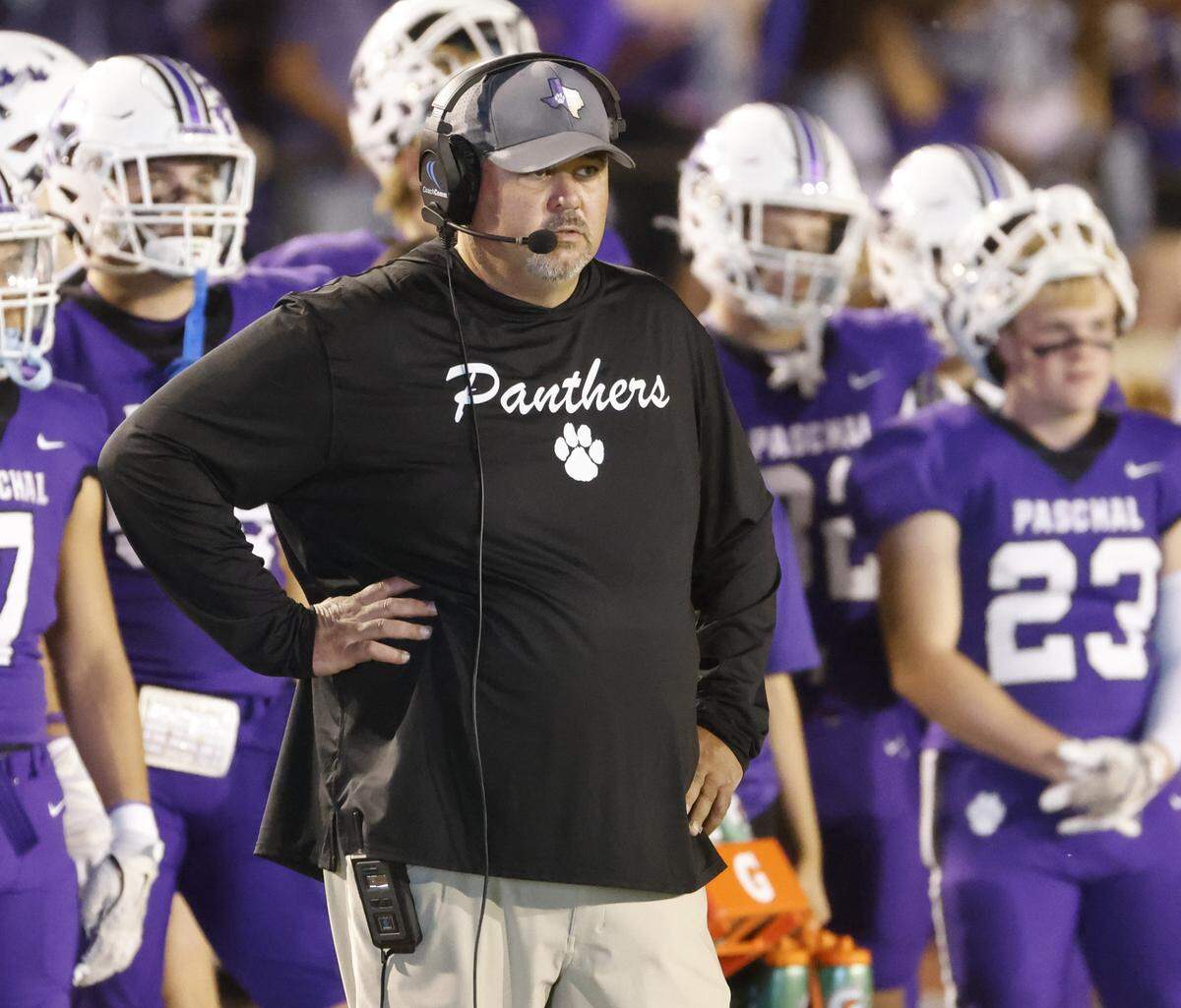 Paschal head coach John Killough watches action late in the first half of a UIL football game between Arlington Heights and Paschal at Farrington Field in Fort Worth, Texas, Friday Nov. 07, 2025.