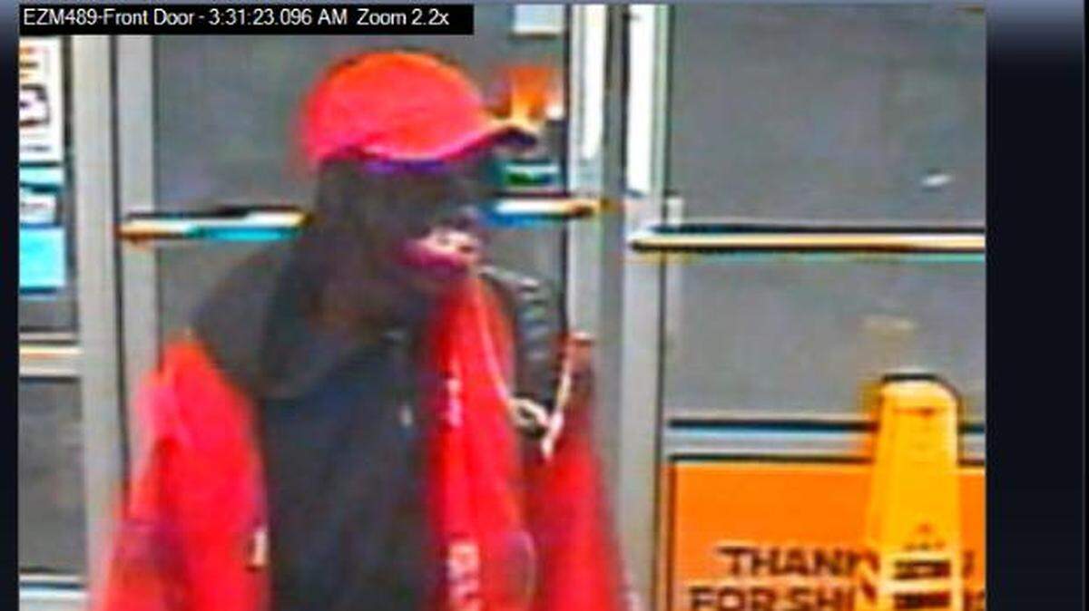 Police believe the person in this still photo from surveillance footage shot and killed a convenience store clerk in Arlington early Sunday morning.