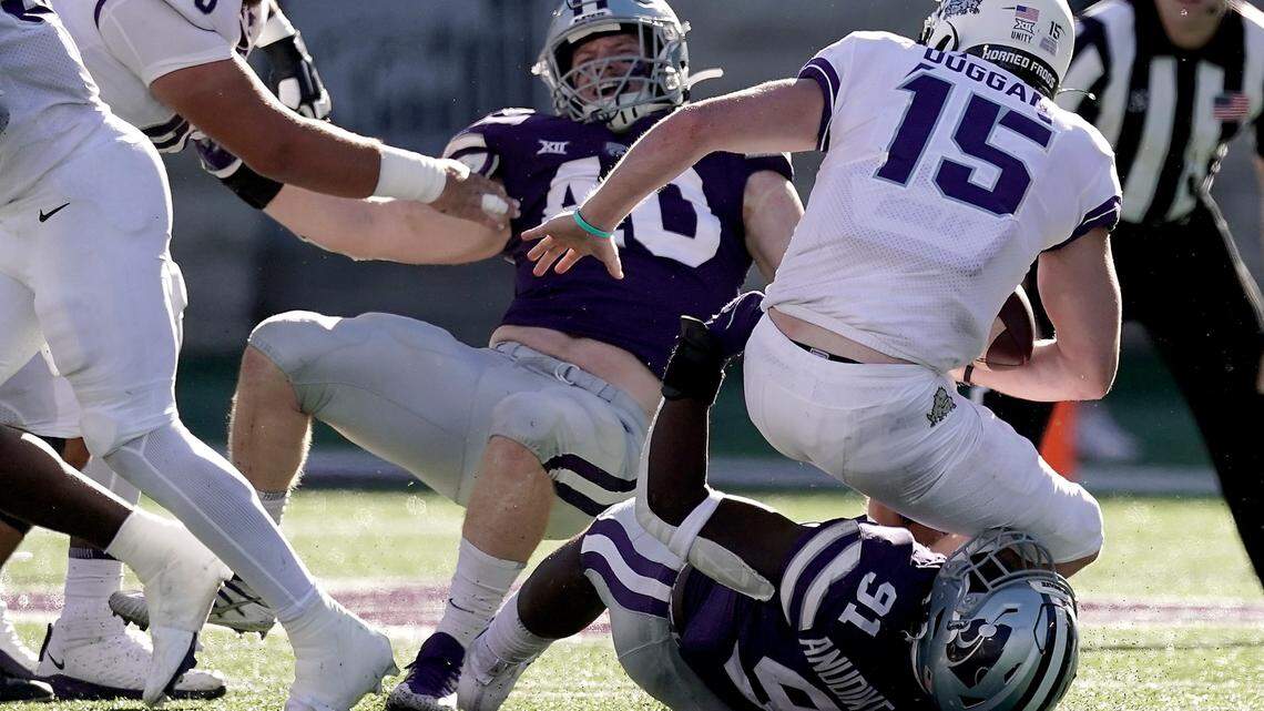 TCU quarterback Max Duggan (15) is sacked by Kansas State defensive end Felix Anudike-Uzomah (91) during the on Oct. 30, 2021, in Manhattan, Kan.