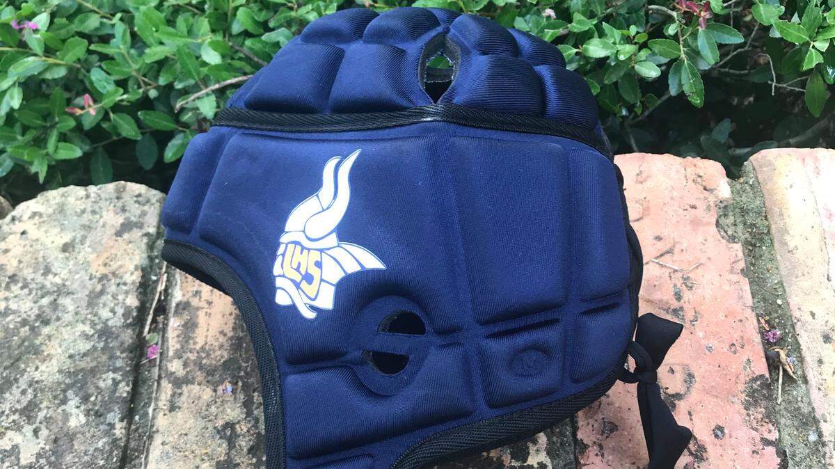 Arlington Lamar's 7-on-7 team is wearing these helmets after a teammate suffered a severe injury earlier this season.