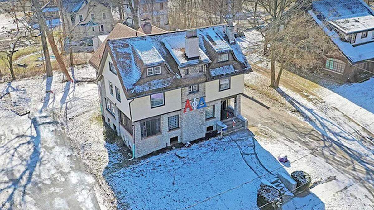 You could tell it’s a former frat house thanks to those Greek letters