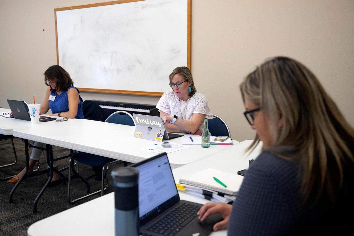 Keller Independent School District administrator Lynn Jameson plans lessons with other teachers at the Keller ISD Education Center in Keller, Texas, on July 21, 2022.