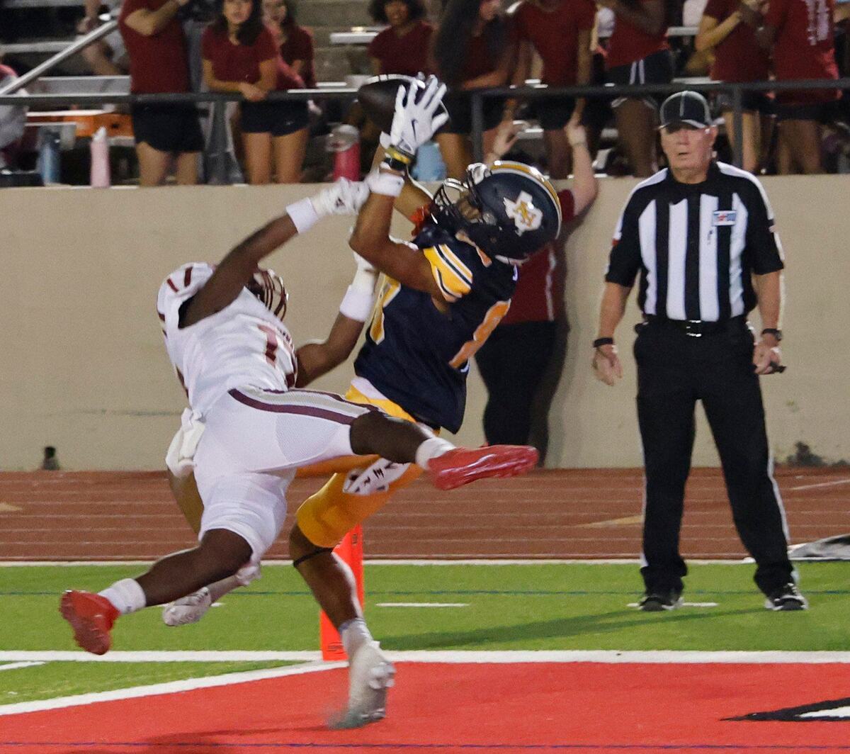 Arlington Heights defensive back Antonio Johnson (88) intercepts the pass intended for Saginaw wide receiver Boaz Kaloso (17) in the end zone during a District 4-5A D1 football game at Farrington Field in Fort Worth, Texas, Thursday, Oct. 10, 2024. (Special to the Star-Telegram / Bob Booth)