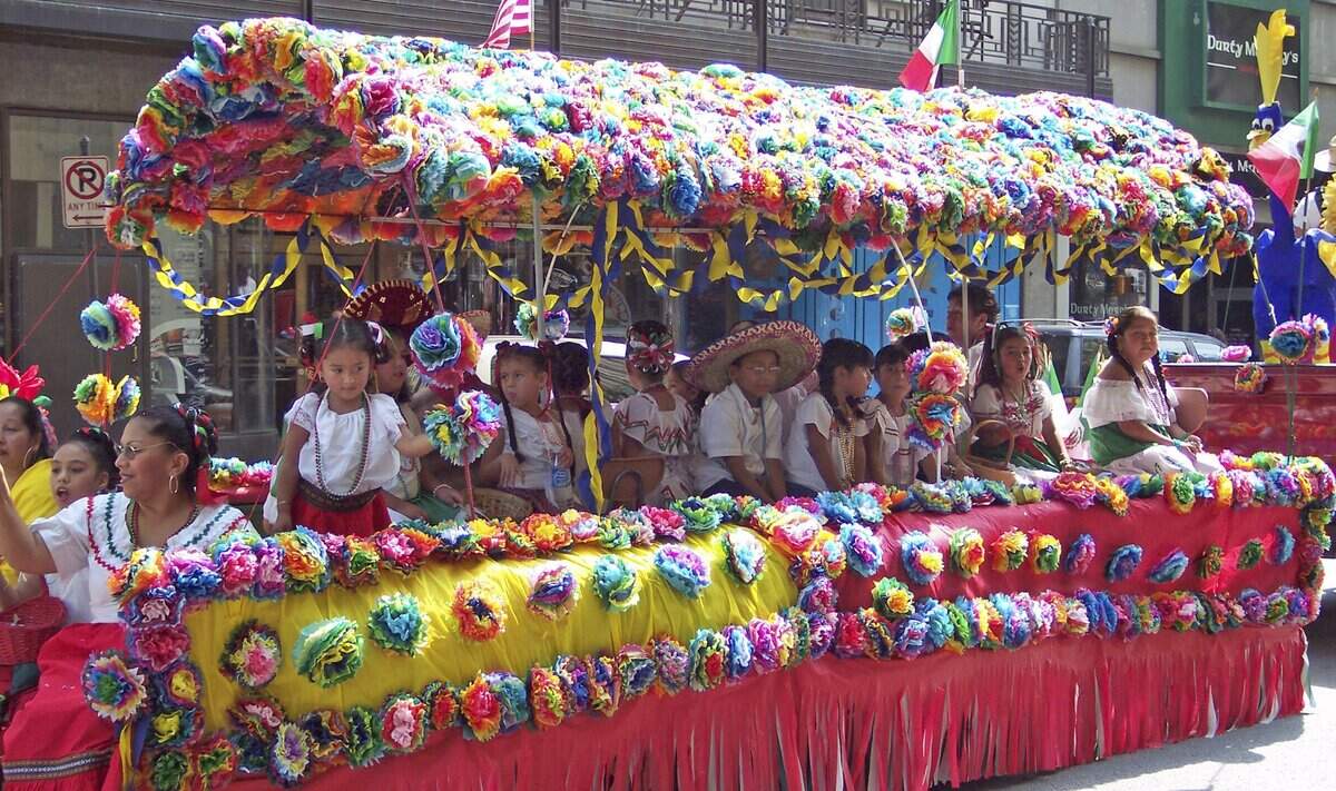 Sept. 12, 2006: Students from Charles Nash Elementary ride on a float as part of the annual 16 de Septiembre parade celebrating Mexican Independence Day through downtown Fort Worth.