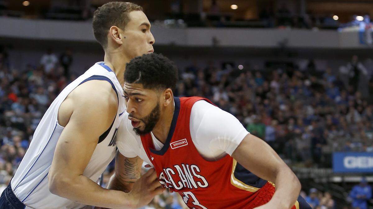 Pelicans forward Anthony Davis, right, scored 23 points with 13 rebounds to help drive New Orleans past Dwight Powell and the Dallas Mavericks, March 4, 2018