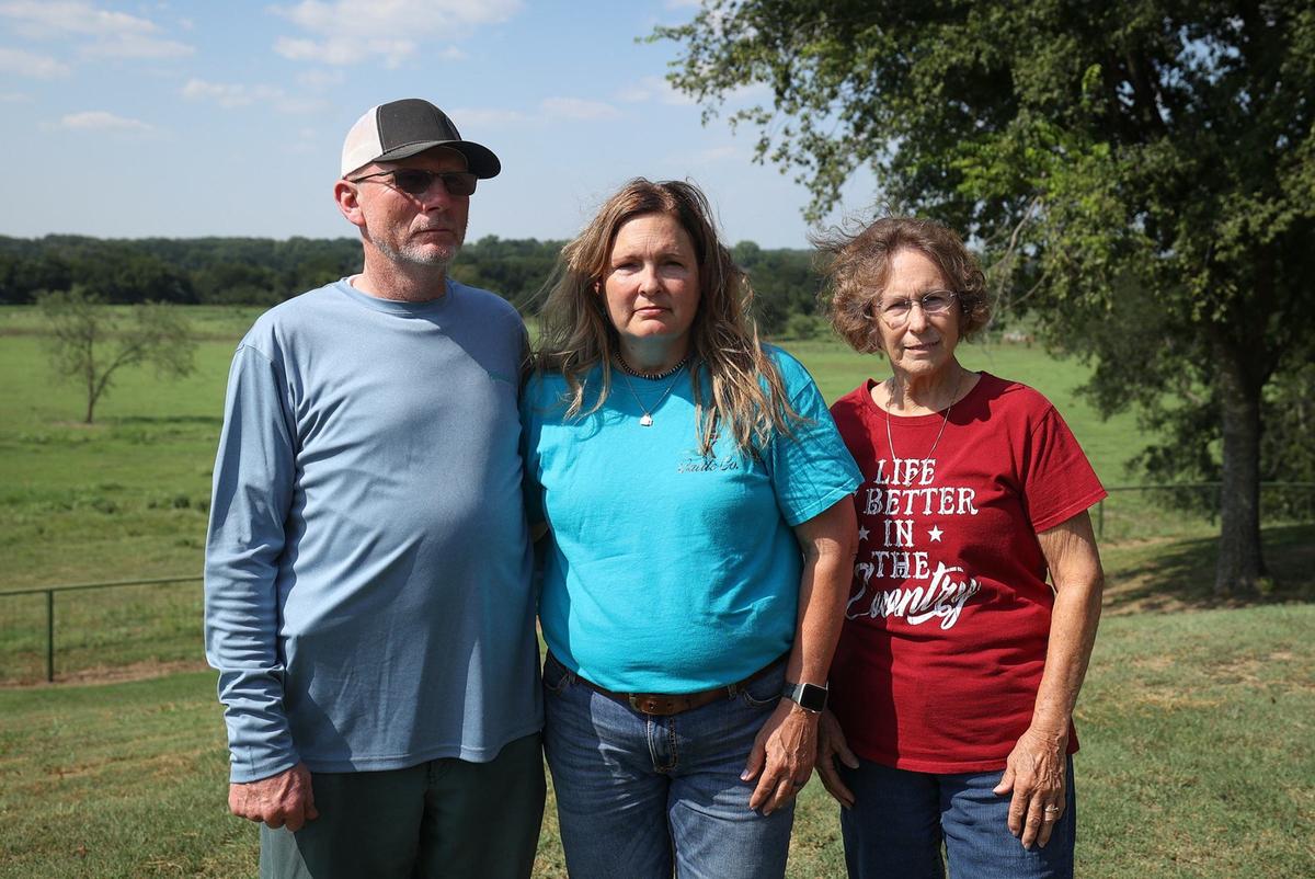 Tony Coleman, left, Karen Coleman and her mother, Patsy Schultz, are three of the five farmers in a legal battle with the EPA and fertilizer manufacturer Synagro Technologies Inc. The families seek more than $75,000 in damages from Synagro because they cannot sell their cattle and their land is “almost worthless” as a result of the contamination by the fertilizer from a neighboring farm.