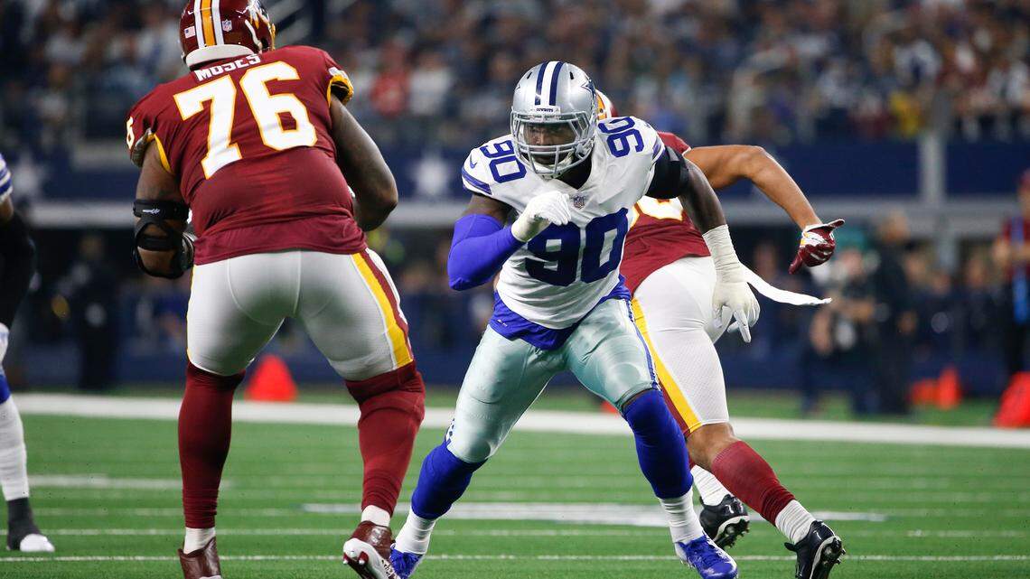 Dallas Cowboys defensive end Demarcus Lawrence had his first-career interception on Thursday. The Cowboys had a season-high three inrerceptions in the 31-23 win.