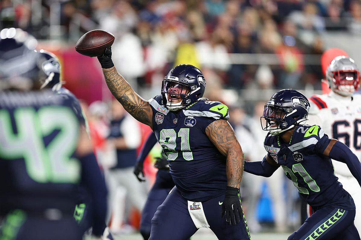 Seahawks defensive tackle Byron Murphy II recovers a fumble against the Patriots during the third quarter of Super Bowl LX on Sunday at Levi's Stadium in Santa Clara, Calif.