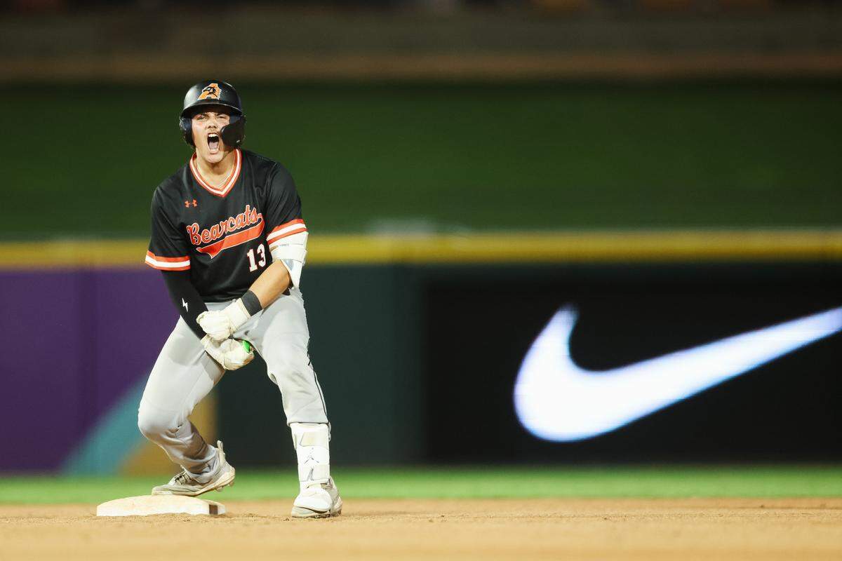 Aledo catcher Brennon Evans yells toward the Aledo bench after hitting a double in the Class 5A Division I playoffs state championship game at Dell Diamond Stadium on Friday, June 6, 2025.