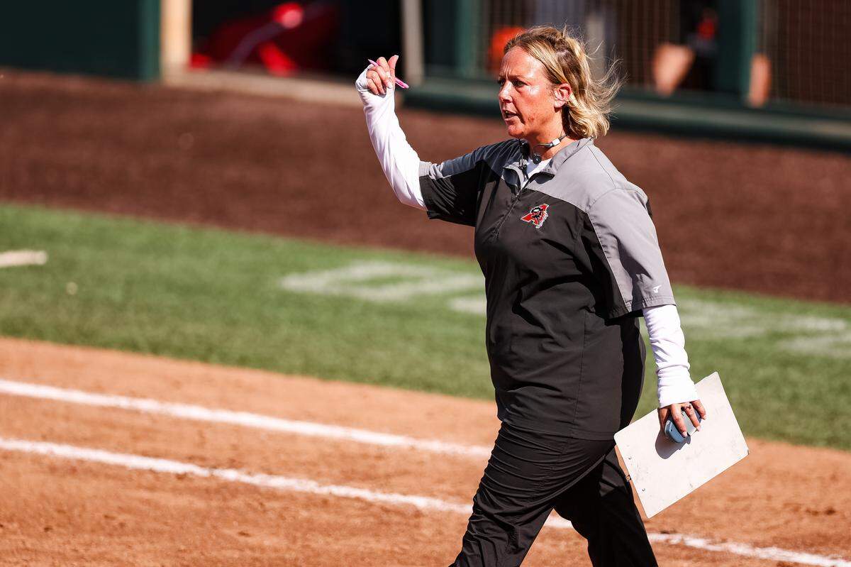 Aledo head coach Heather Myers walks toward the pitchers circle to talk to her pitcher against Barbers Hill in the UIL Class 5A Division I state softball championship game at Red & Charline McCombs field in Austin, Texas, on Friday, May 29, 2026.