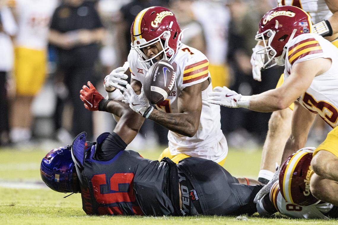 TCU running back Jeremy Payne (26) fumbles the ball and is recovered by Iowa State defensive back Tre Bell (7) in the second half of a Big XII football game between the TCU Horned Frogs and the Iowa State Cyclones at Amon G Carter Stadium in Fort Worth on Saturday, Nov. 8, 2025.