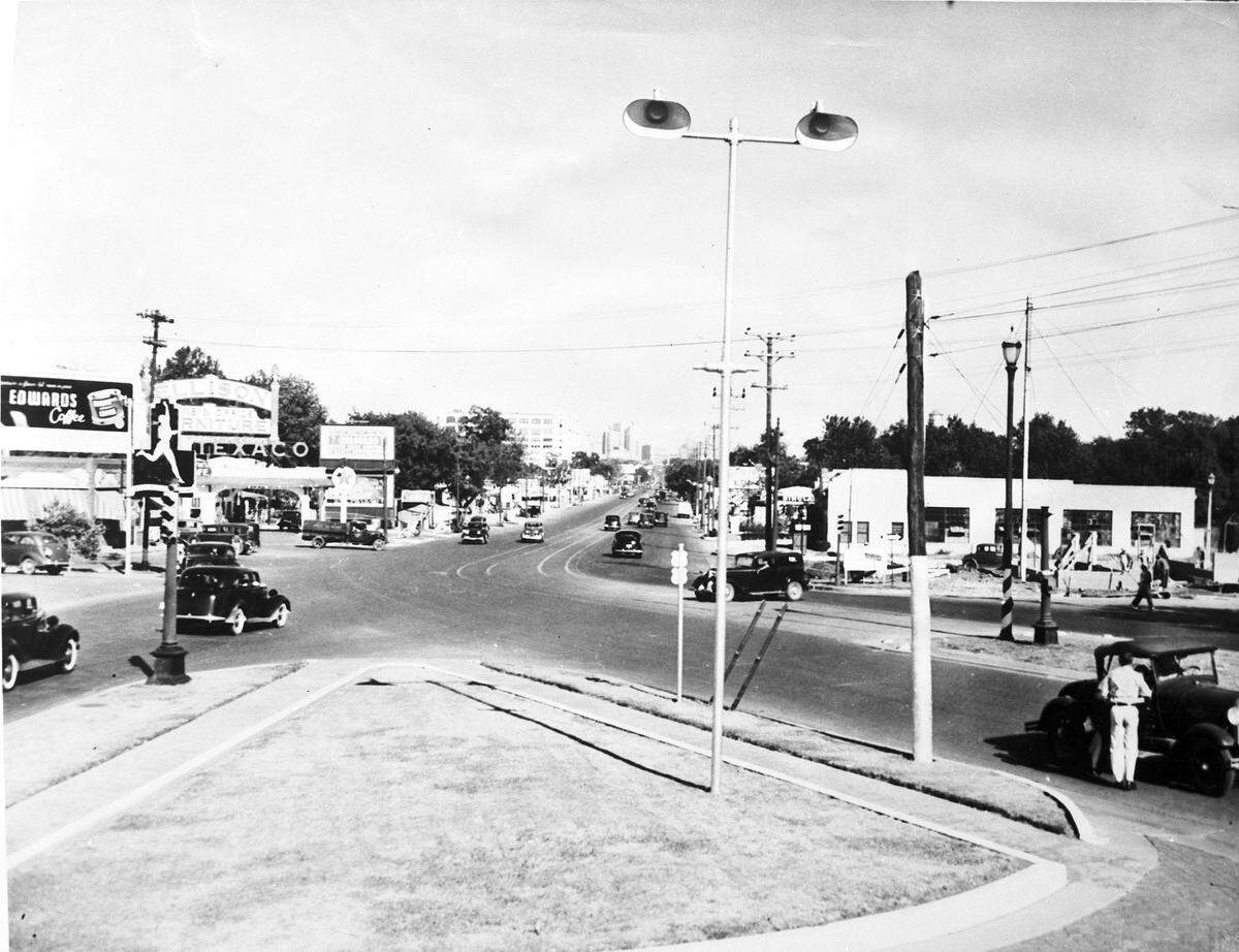 Circa 1940s: “Camp Bowie Blvd., 7th St., and University intersection; looking east down 7th St., Fort Worth”