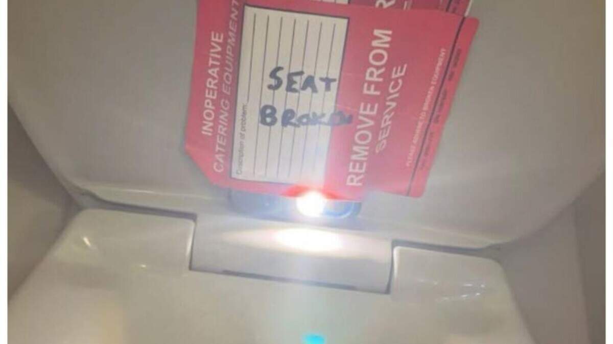 A family of a 14-year-old girl alleges in a lawsuit that she found a cell phone taped to a toilet seat with the camera flash on after she used the restroom on an American Airlines flight from Charlotte to Boston. This photo is from the lawsuit, filed Dec. 1, 2023, in U.S. District Court in Charlotte, North Carolina. The flight attended accused in the case was arrested Thursday, Jan. 18, 2024.