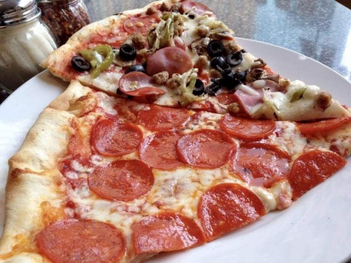 Pepperoni and supreme pizza by the slice at Picchi Pacchi.