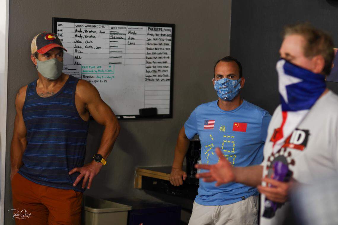 Zach Lewis and Jim McCormick listen to jump instructions.