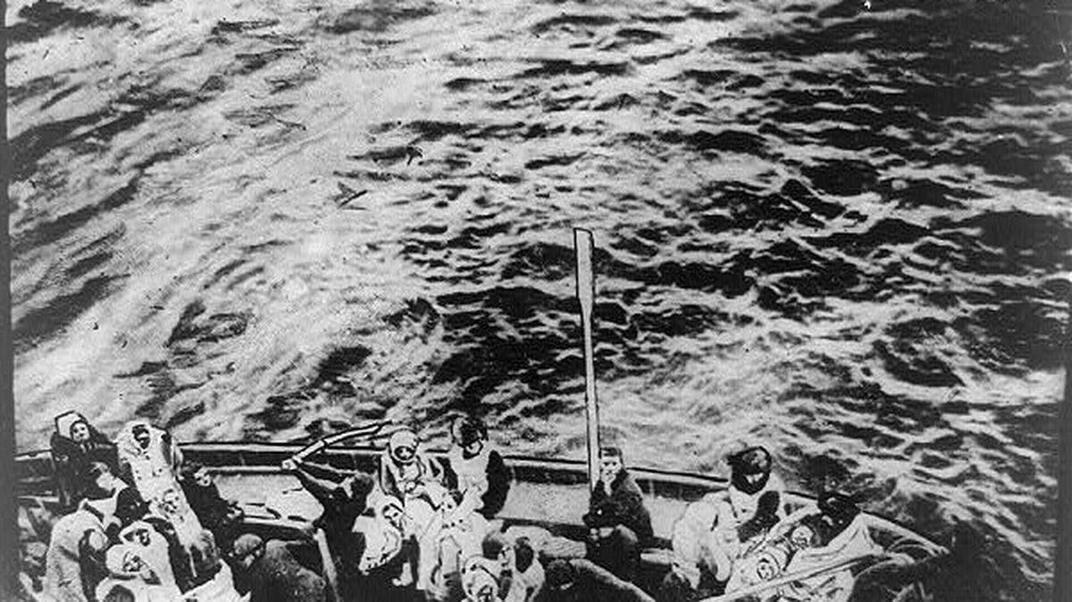 Photograph shows a life boat on the way to the ship Carpathia which rescued the survivors of the sinking of the Titanic.
