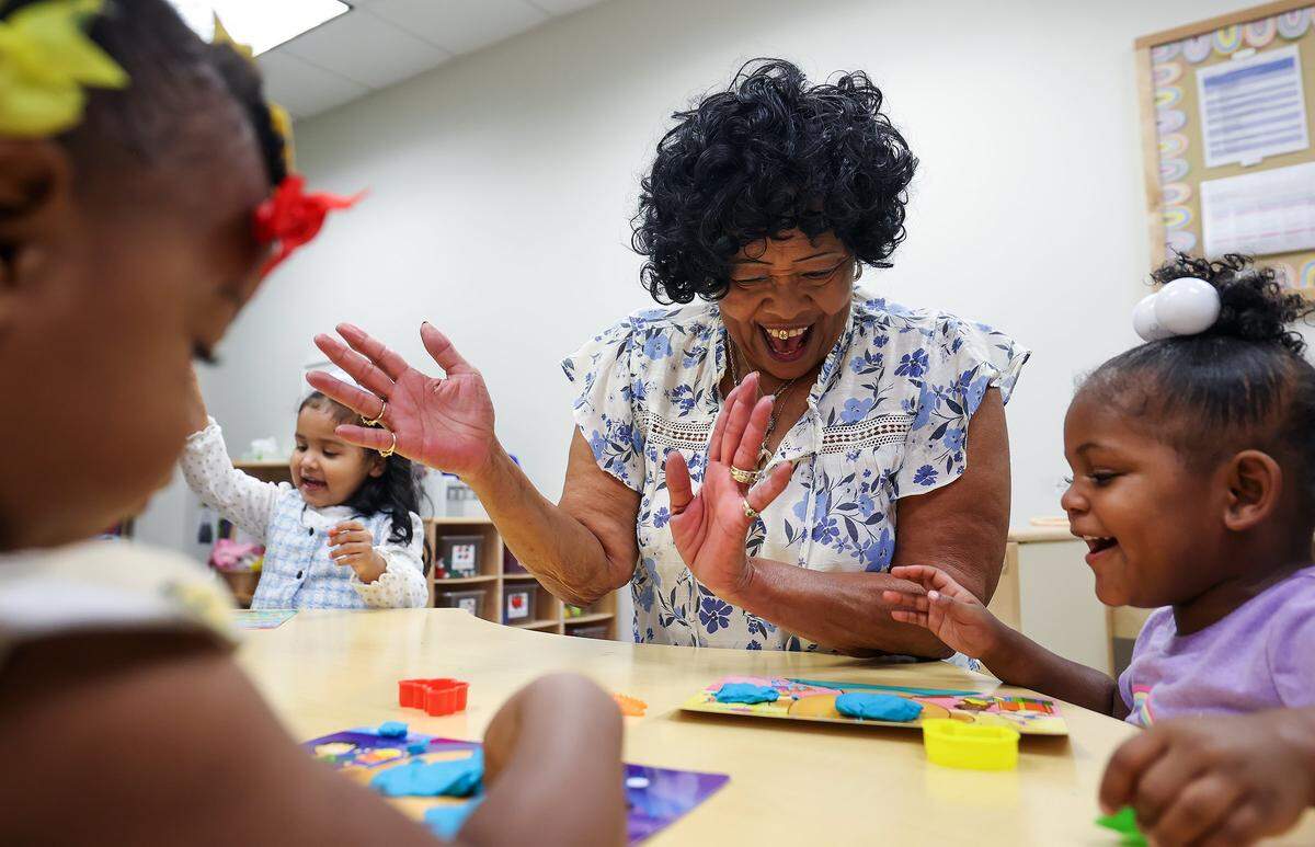 Wanda Fields, 75, interacts with children at the Early Head Start program at J.A. Hargrave Elementary School on Monday, Sept. 15, 2025, in Fort Worth. Fields spends 20 hours a week volunteering through the Texas Health and Human Services' Foster Grandparent program.