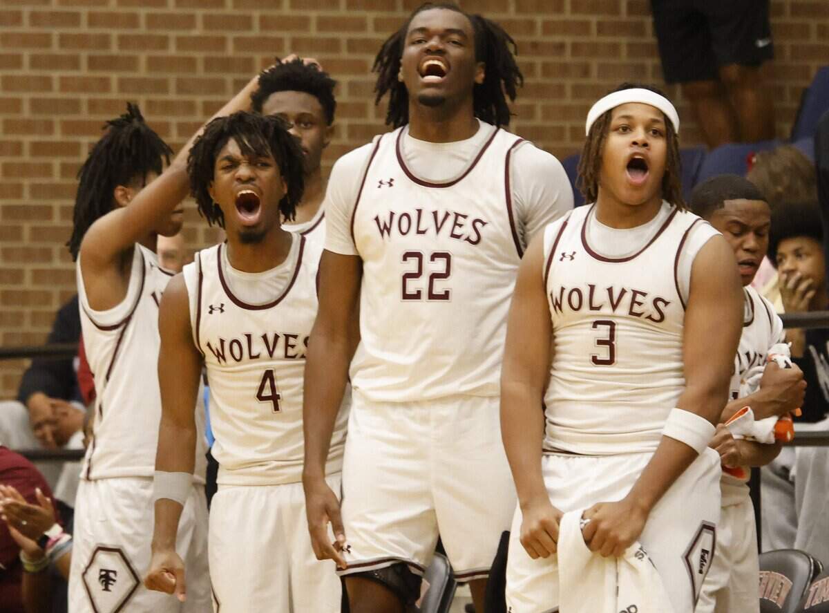 The Wolves bench including, Mansfield Timberview guards Zach Kennedy (4), Grant Nash (3) and forward Jaden Marshall (22) react to a three point bucket against Mansfield Summit during the first half of a UIL boys basketball game at Mansfield Timberview High School in Arlington, Texas, Tuesday Feb. 10, 2026.