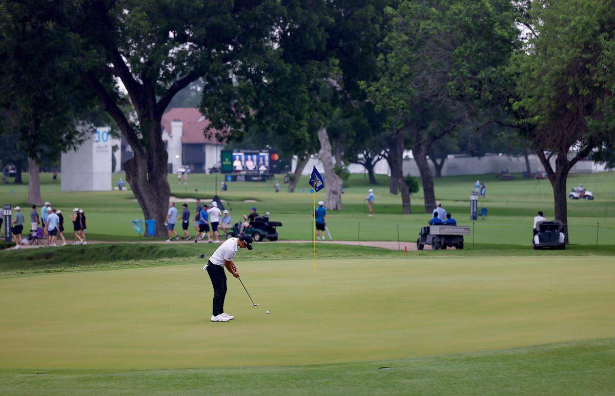 Collin Morikawa putts during the first round of the Charles Schwab Classic at Colonial Country Club in Fort Worth on Thursday, May 23, 2024.