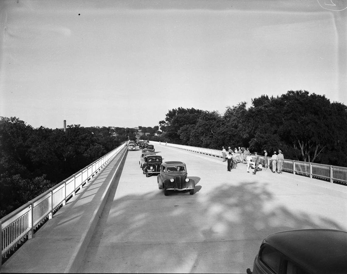 June 14, 1939: West Lancaster Avenue bridge formal opening. A parade of officials who made the first public crossing of the bridge with a police escort, Fort Worth, Texas.