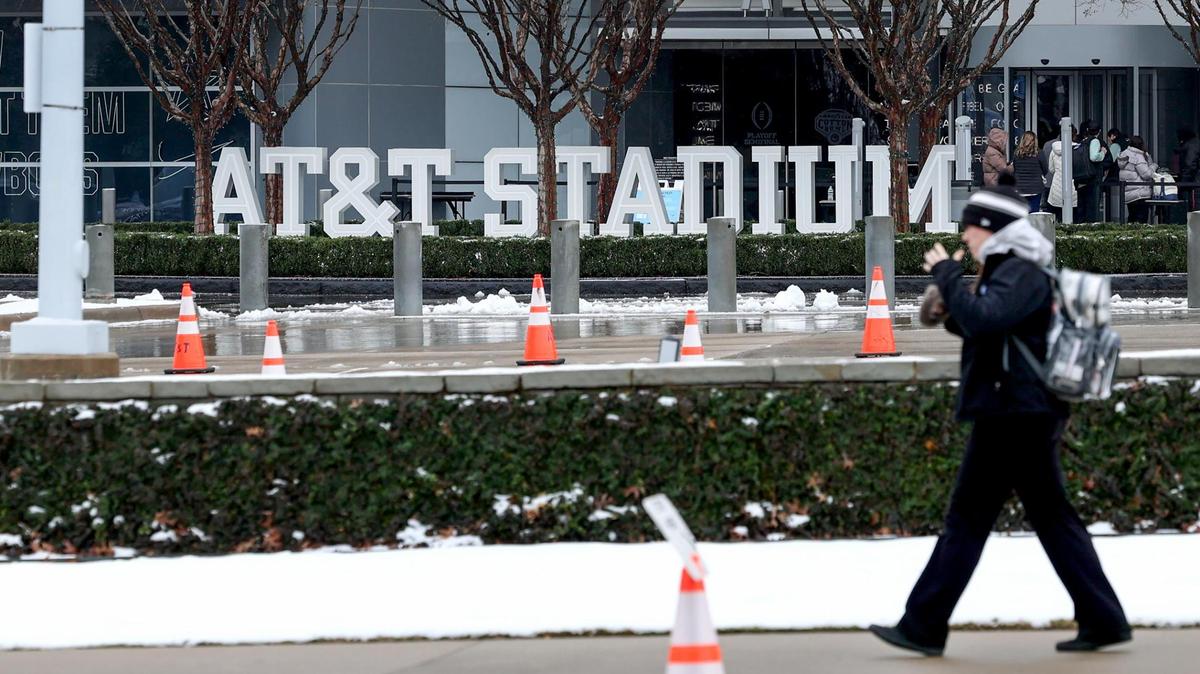 Patches of snow remain from a mostly cleared AT&T Stadium on Friday, Jan. 10, 2025, in Arlington. The Cotton Bowl kicks off at 6:30 p.m. on Friday.