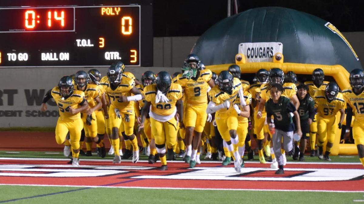 Western Hills takes the field after halftime during a high school football game against Poly at Farrington Field in Fort Worth, Texas, Friday, September 9, 2022. Western Hills won 39-0. (Hawaii Guerin/Special to the Star-Telegram)