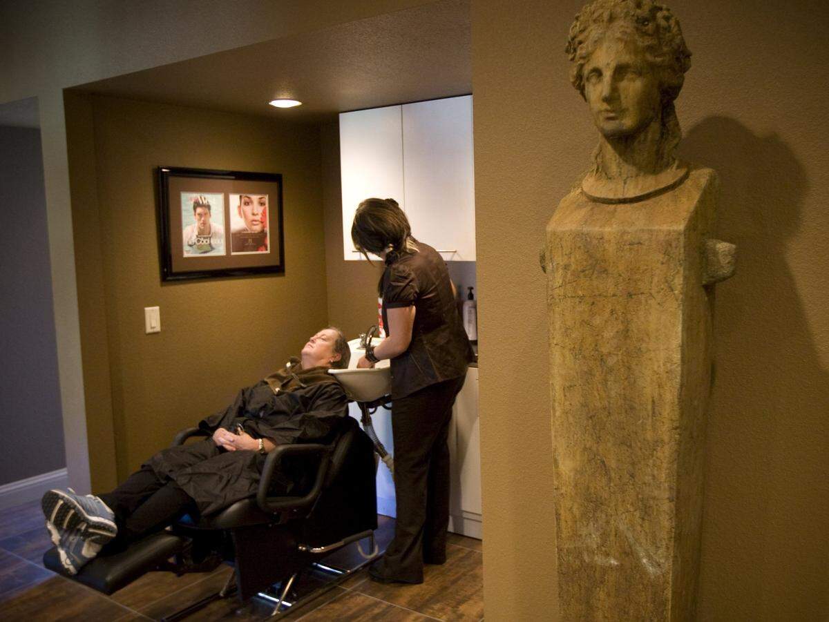 2009: The Havens Spa in Weatherford: Becky Graves of Aledo has her hair washed by hair designer Ruby Jane Hickey
