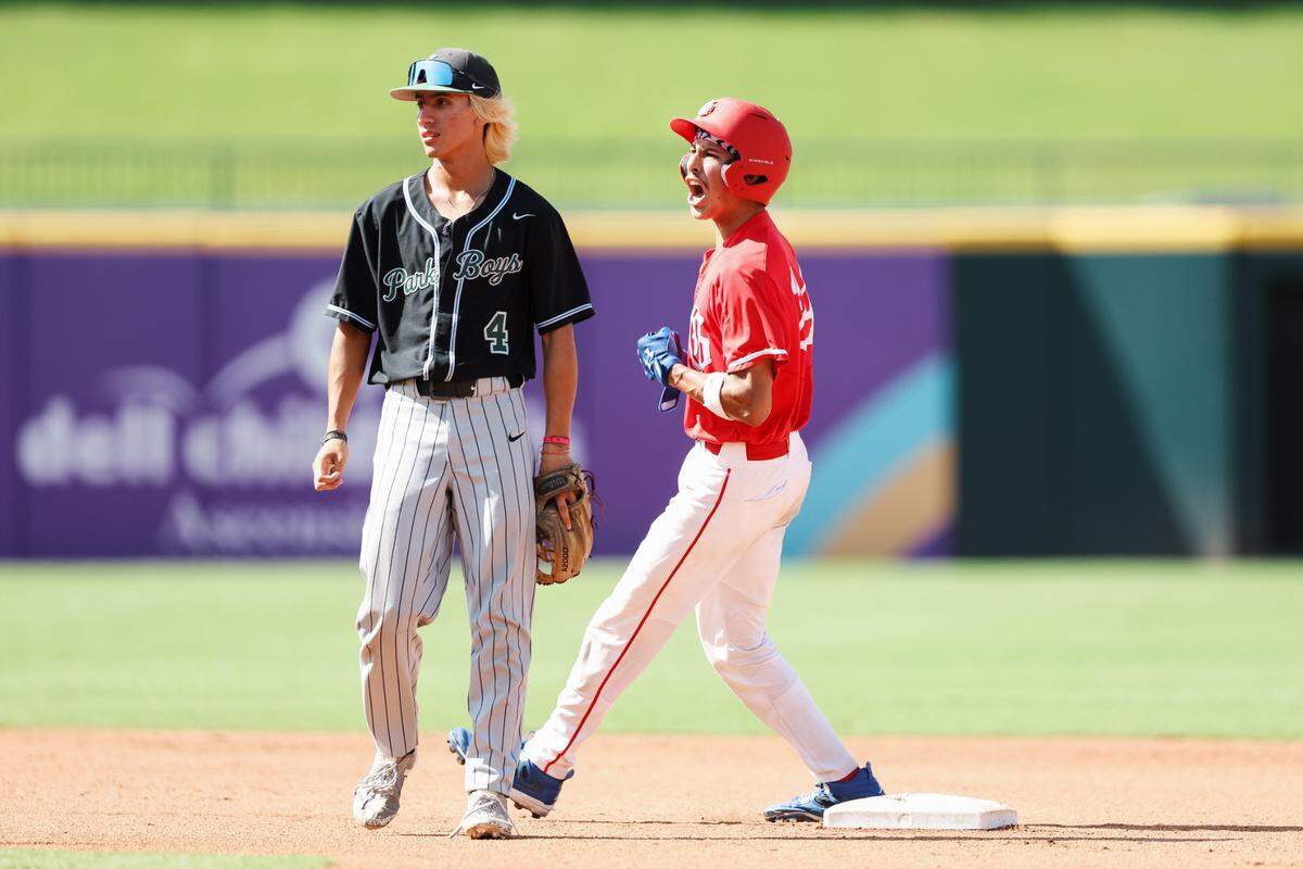 Grapevine catcher Gianni Corral screams at second base in celebration after driving in a run with a base hit in the Class 5A Division II state championship game against Kingwood Park on Friday, June 6, 2025 at Dell Diamond in Round Rock, Texas.