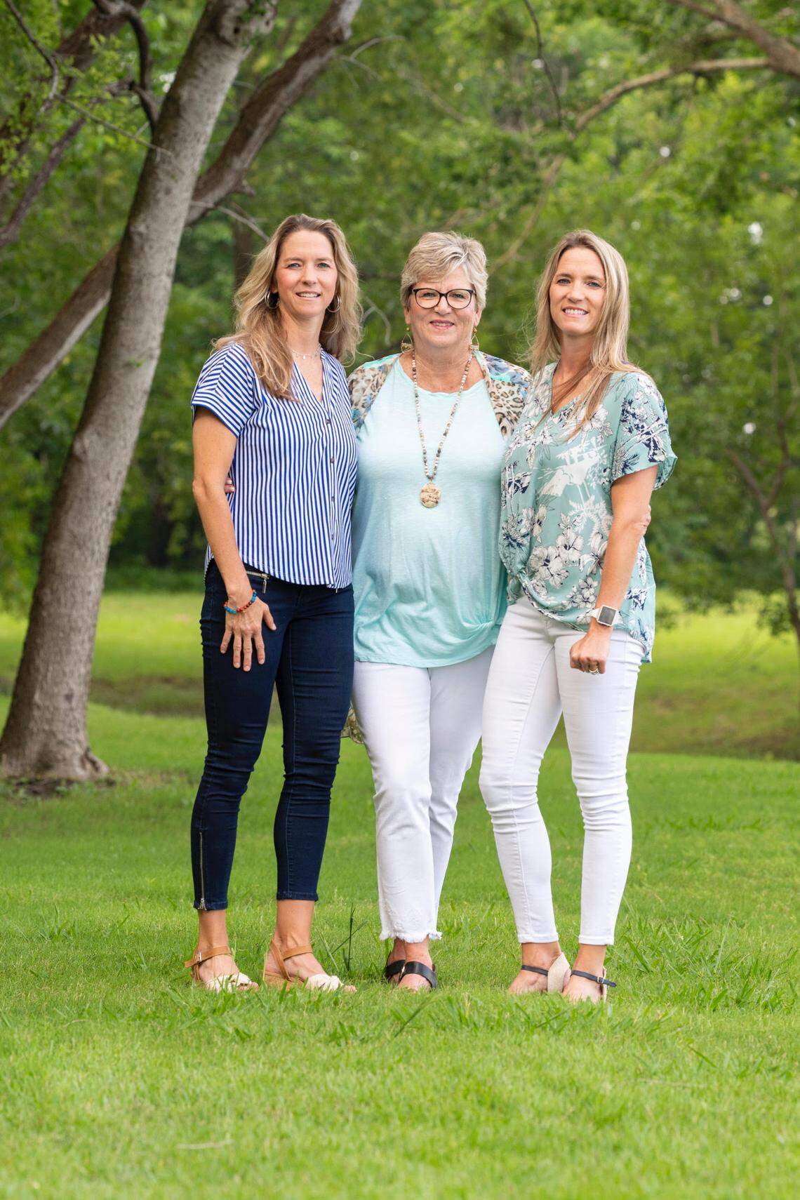 Now married with children, TCU alums Jill Dodd (left) and Amy Porter enjoy following all of TCU athletics, with a keen eye on the state of the women’s basketball team. They are pictured here with their mother, Brenda Hankey.