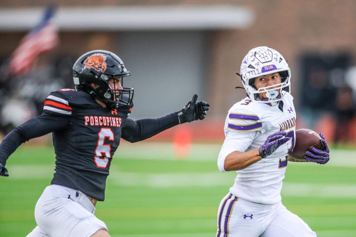 Alvarado receiver Schyler Dethorne looks to move past Springtown’s Riley Jackson after a long reception during a Class 4A Division I regional semifinal Friday, Nov. 28, 2025, at Knight Stadium at Eagle Mountain High School in Fort Worth.