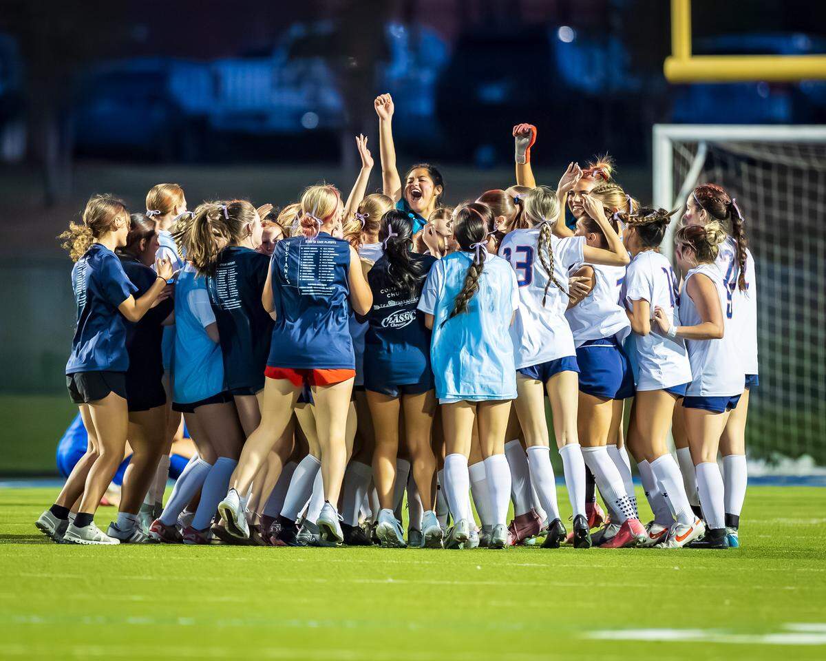 The Grapevine girls soccer team celebrates after defeating Joshua in a Class 5A Division 2 area-round match on Tuesday, March 24, 2026 at Brewer High School in Fort Worth, Texas.
