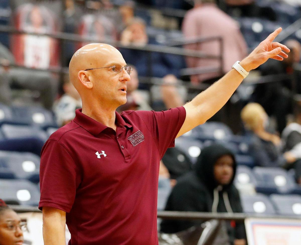 Timberview head coach Duane Gregory signals to the court during the Whataburger Basketball Tournament at Mansfield Legacy High School in Mansfield, Texas, Wednesday, Dec. 29, 2021. TImberview led 29-11 after one quarter. (Special to the Star-Telegram Bob Booth)
