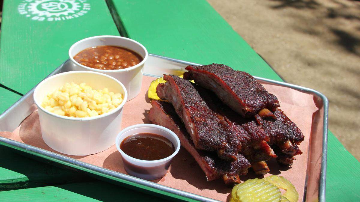 A rib plate from Not Just Q, from former TCU football player David Hawthorne. Its first brick-and-mortar location will be inside Foodhall at Crockett Row