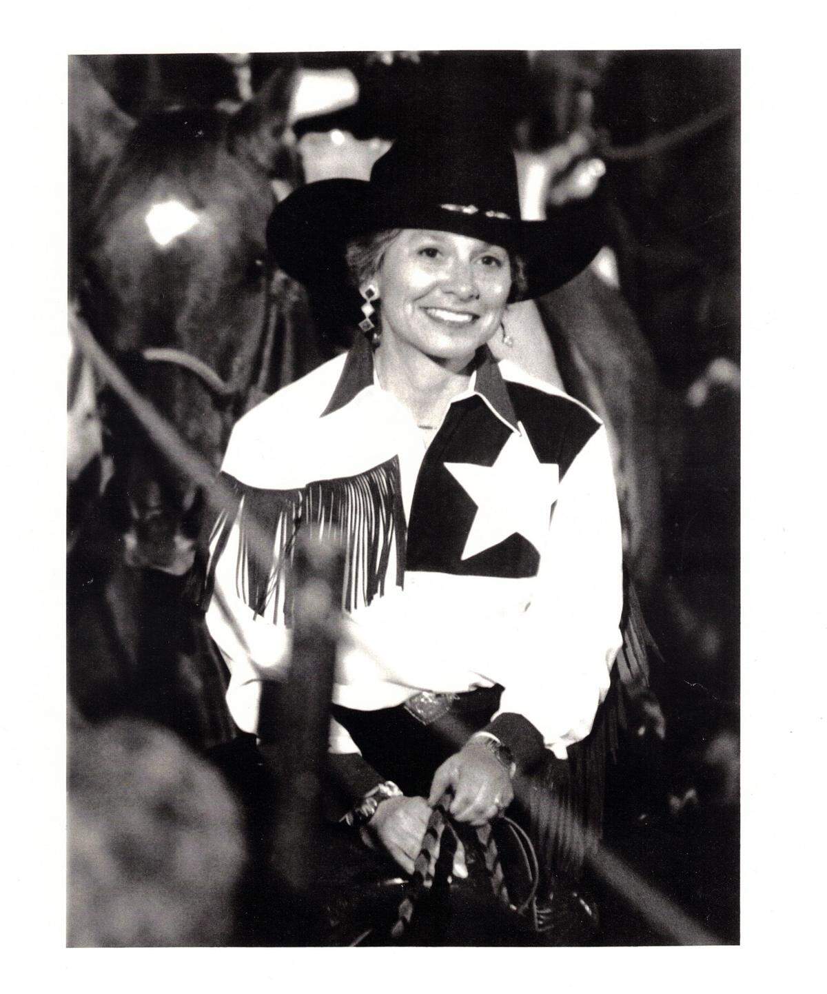 The author of this column, Hollace Ava Weiner, is shown here riding in the Fort Worth Rodeo grand entry, circa 2001.