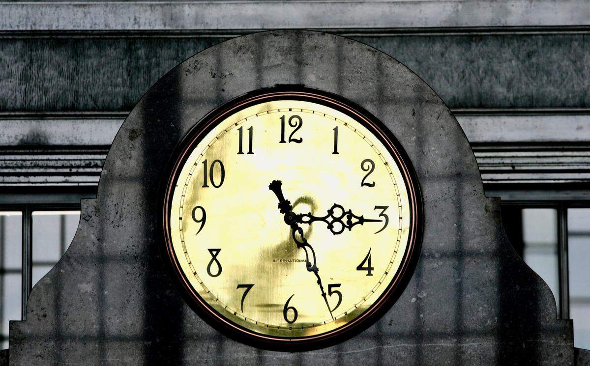 A large clock looms over the main entrance  of the former Texas & Pacific Railway Terminal Main Waiting Room in Fort Worth, now Texas and Pacific Lofts, on April 14, 2006.