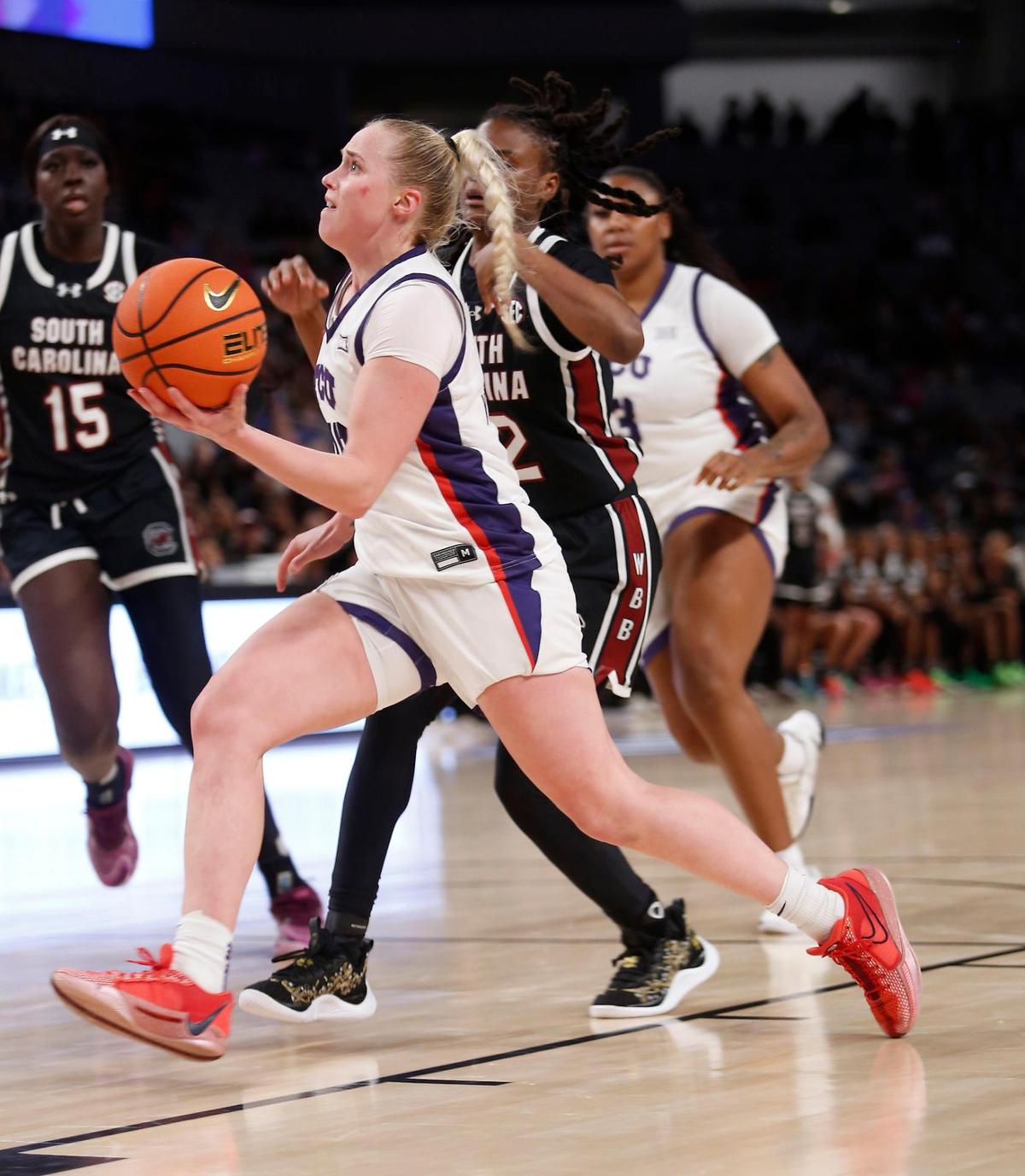 TCU’s Hailey Van Lith drives to the basket during their game on Sunday, December 8, 2024 at Dickies Arena.