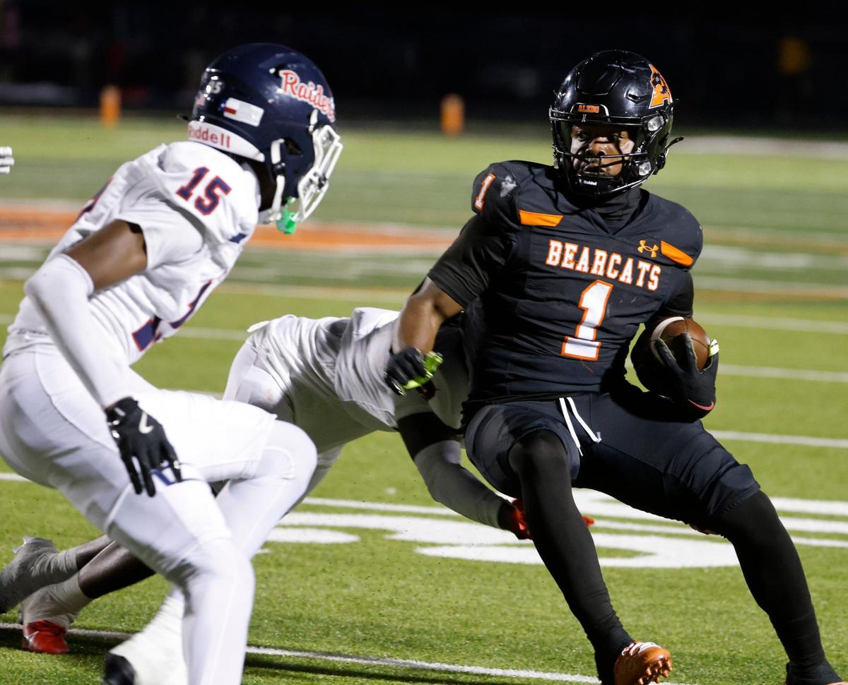 Aledo running back Racine Guillory (1) cuts back into the defense of Denton Ryan defensive back Xaier Hiler (15) during a UIL football game at Buchanan Stadium in Aledo Texas, Friday, Oct. 04, 2024.