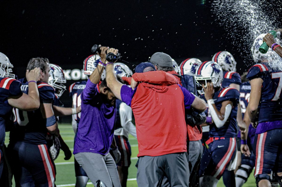 Richland coaches and players celebrate after the Royals defeated Mansfield Timberview in a key District 5-5A Division 1 football game on Friday, October 27, 2023 at Birdville Fine Arts/Athletics Complex in North Richland Hills, Texas.