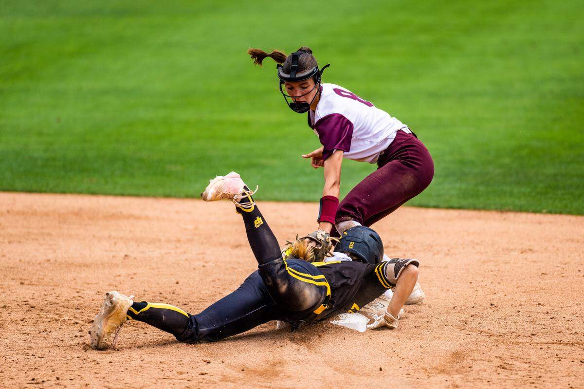 Championship game MVP Makenzie Mounts of Corpus Christi Calallen applies a tag at second base against Liberty in the Class 4A state title game on Saturday, June 3, 2023 at McCombs Field in Austin, TX.