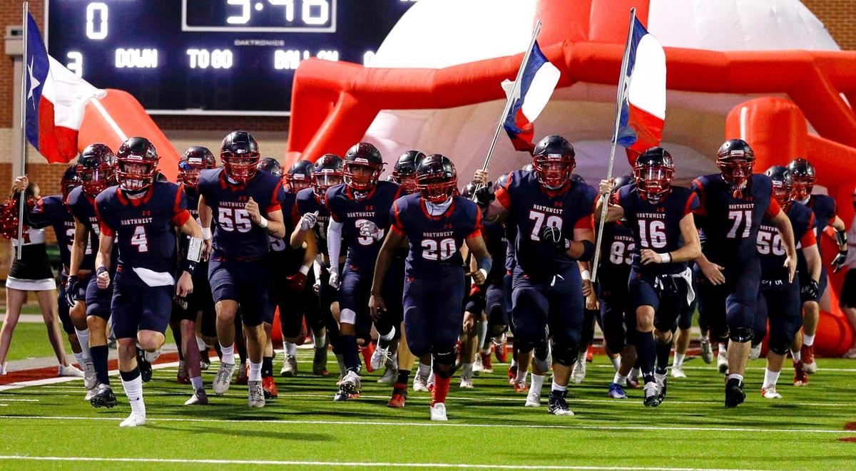 The Justin Northwest Texans enter the field to face Brewer in a high school football game, Thursday night, November 19, 2020 played at Northwest ISD Stadium in Justin, Tx. (Steve Nurenberg Special to the Star-Telegram)