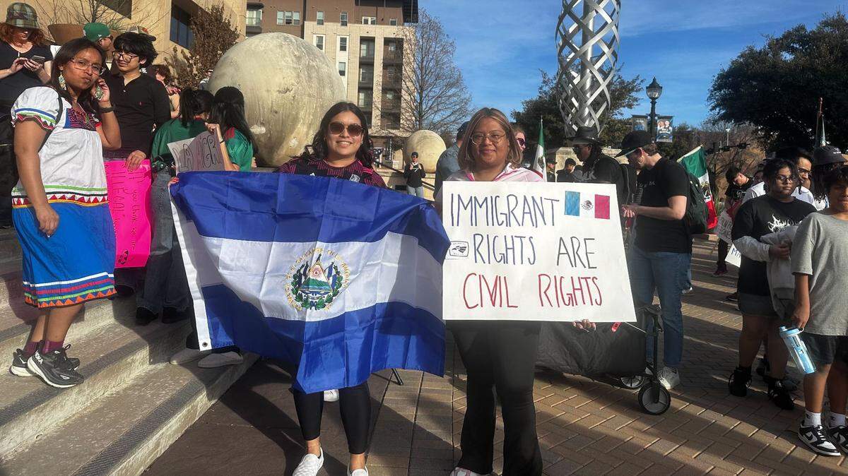 Teresita Merino (left) and Yenis Andrade (right) were outside Arlington City Hall on Sunday, Feb. 2, to protest against President Trump’s mass deportation.