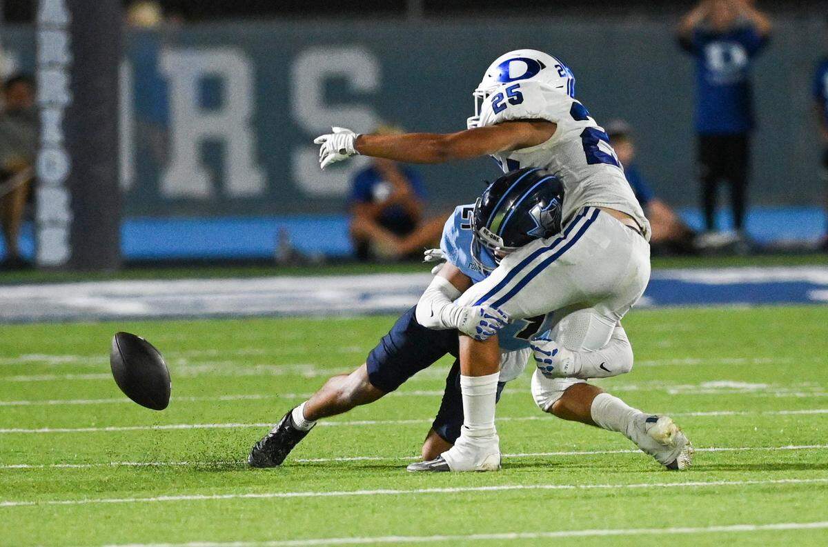 Liberty Christian defensive back Lukas Bryant tackles Decatur tight end Alex Pantoja during a UIL football game against Decatur at Warrior Stadium in Argyle, Texas on Friday, Sept. 13, 2024. Liberty Christian Warriors won 49 - 21.
