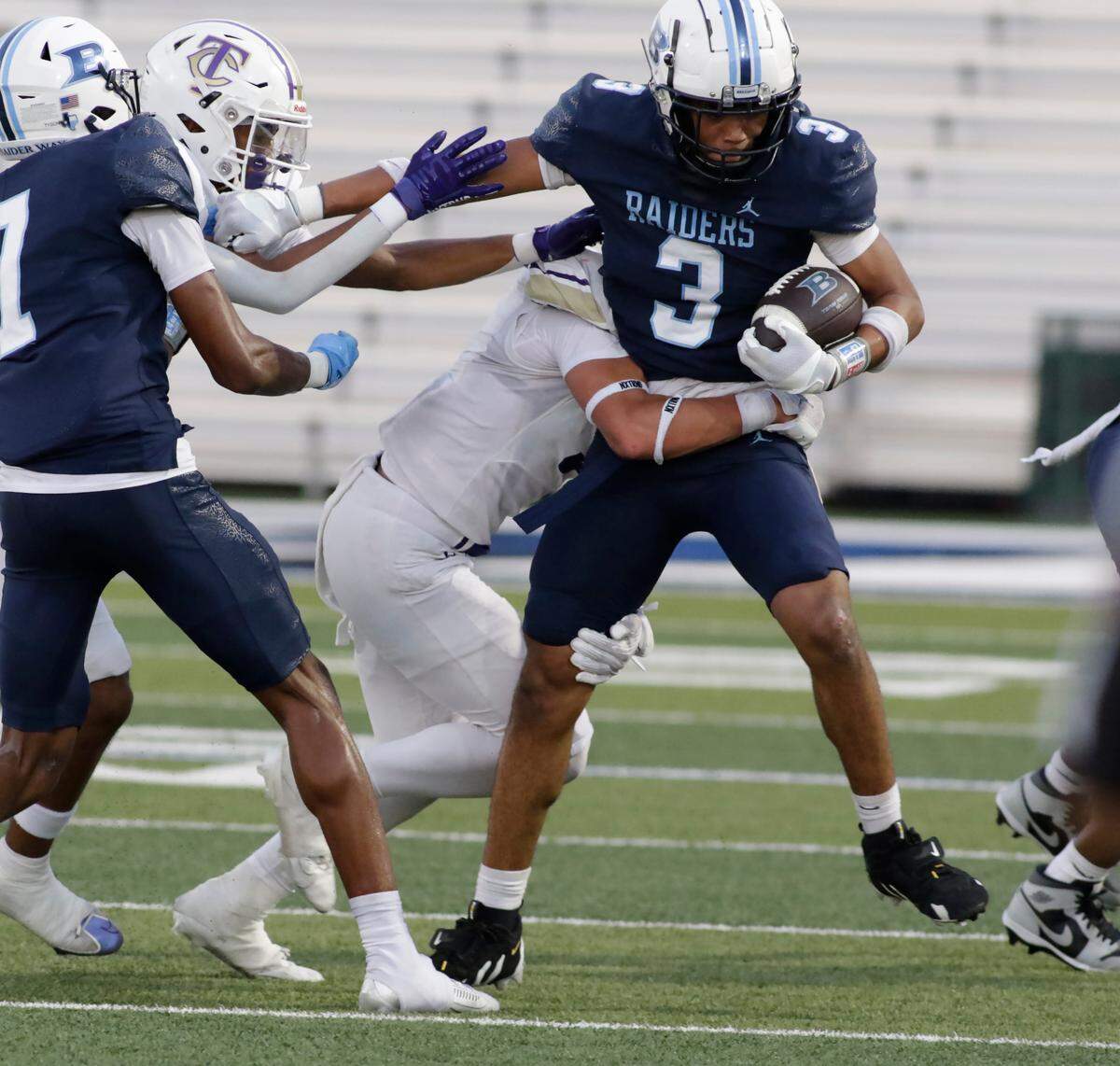 L.D. Bell’s Braelon Solomon is tackled during their UIL football game Friday night at Pennington Field in Hurst on Friday Sept. 6, 2024.