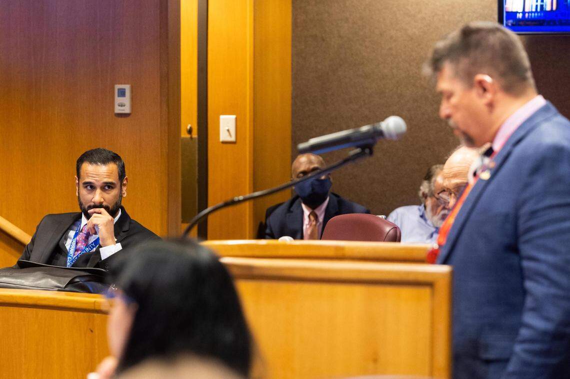 Heider Garcia listens as Troy Havard addresses the Tarrant County Commissioners during a work session to discuss the election process Tuesday, April 26, 2022, at the Tarrant County Administration Building in downtown Fort Worth.