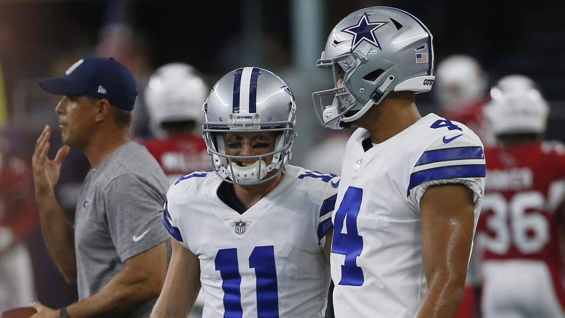 Cowboys wide receiver Cole Beasley, left, defended the receiving unit after the offense’s slow start through three games.
