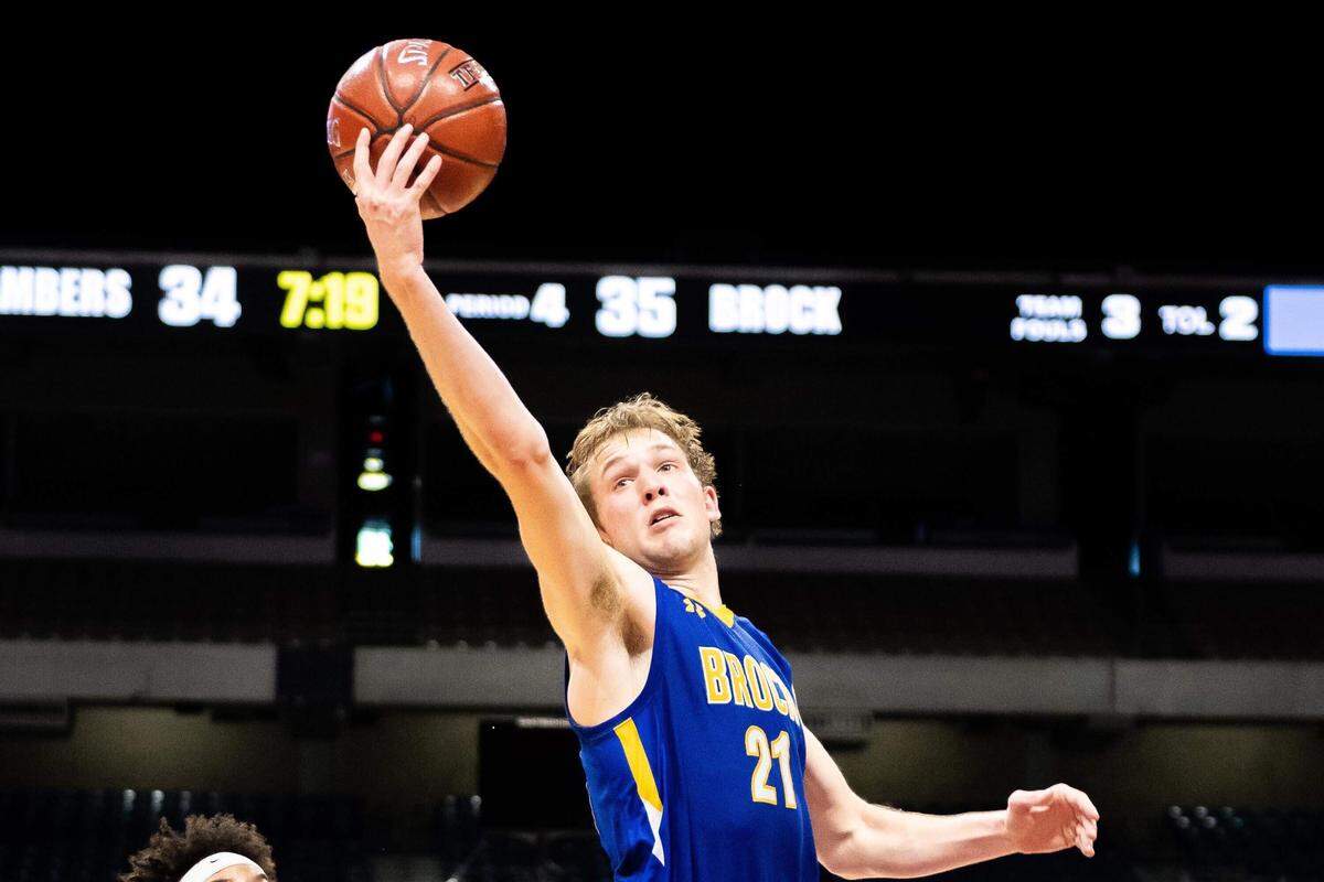 Brock senior Scott Thomas grabs one of his team-leading seven rebounds during the 3A state semifinals, Thursday March 7, 2019.